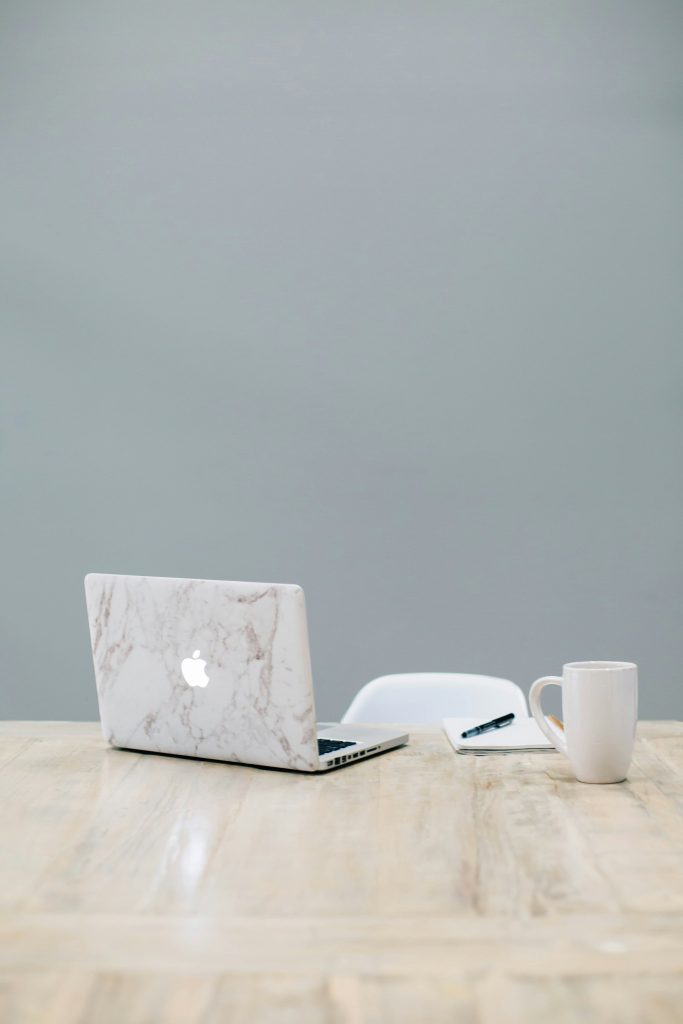 empty desk with computer