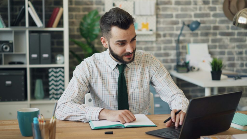 man on computer